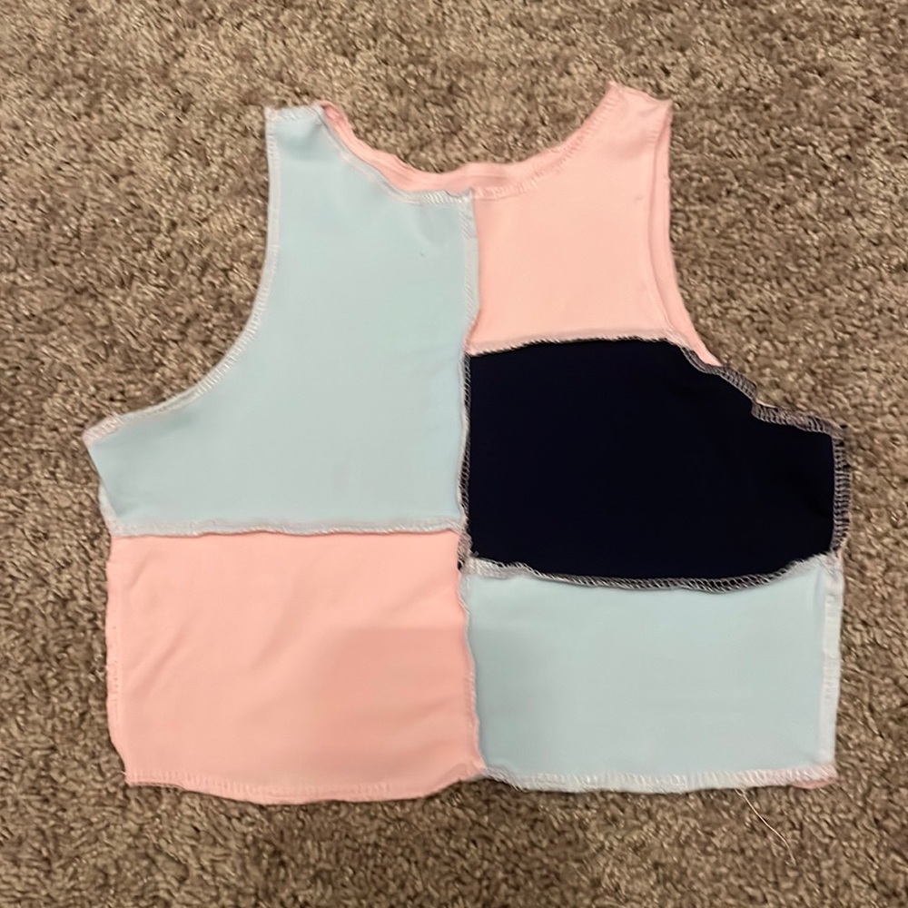 Different sewn patch shirt.